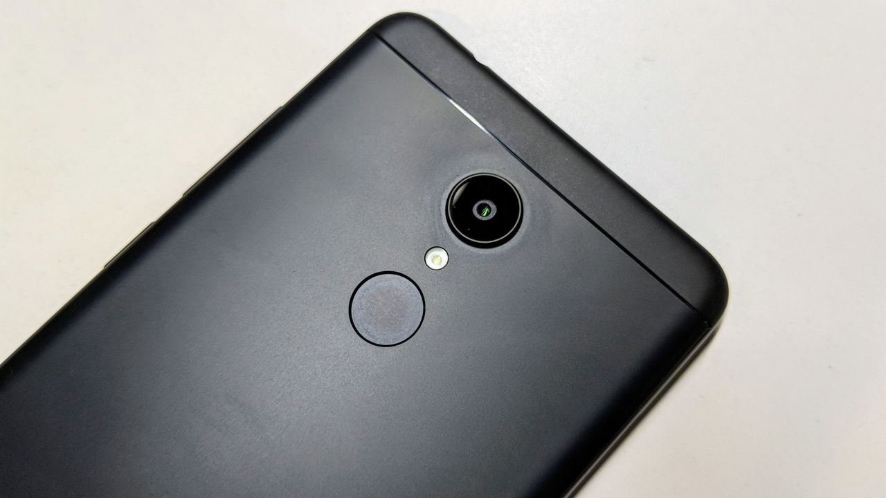 Rear camera and fingerprint sensor