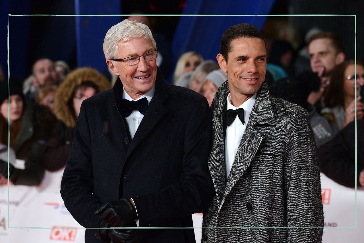 a medium shot of Paul O&#039;Grady with husband Andre Portasio on the red carpet