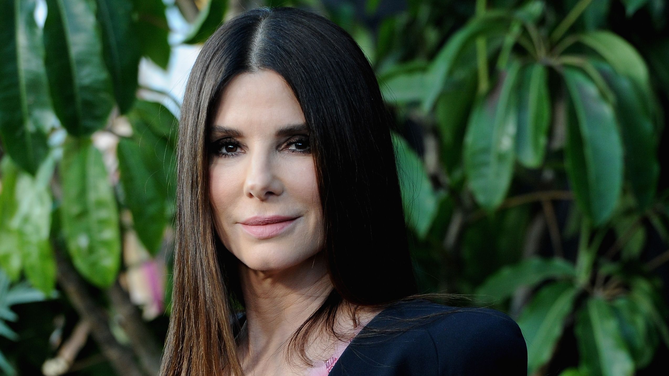 Sandra Bullock proves blazers and evening dresses are a perfect match