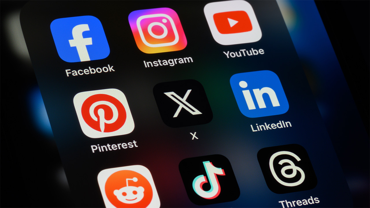 iPhone screen displaying various social media apps