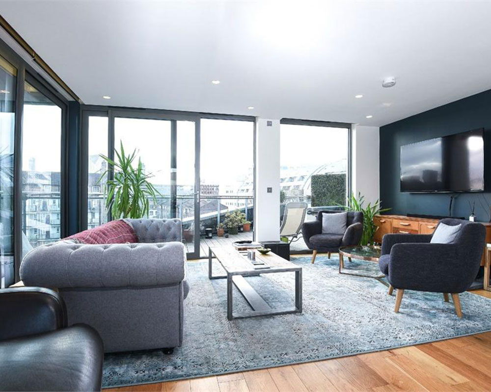 living room with wooden flooring and sliding glass doors
