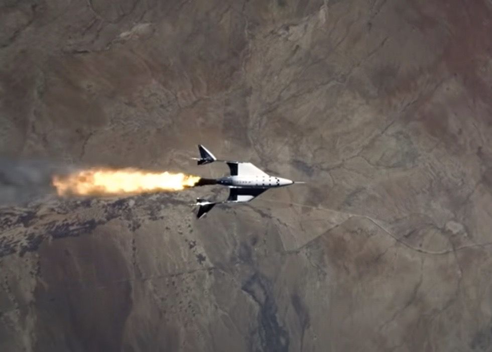 This screenshot from a Virgin Galactic video shows the company&#039;s VSS Unity vehicle firing up its rocket motor during its third test flight to suborbital space, on May 22, 2021.