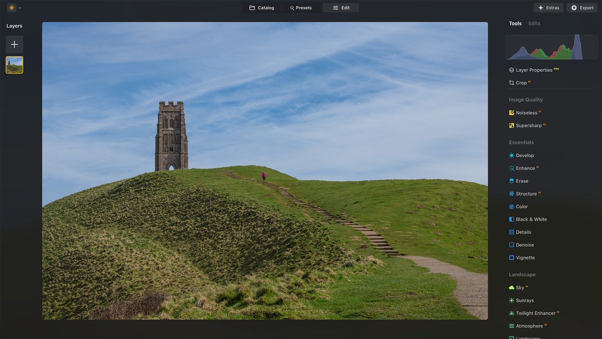 Luminar Neo screenshot showing historic building on hill with blue sky