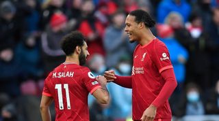Mohamed Salah and Virgil van Dijk in action for Liverpool.