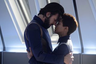 Tyler (Shazad Latif) and Burnham embrace before the attempt to capture the Red Angel.