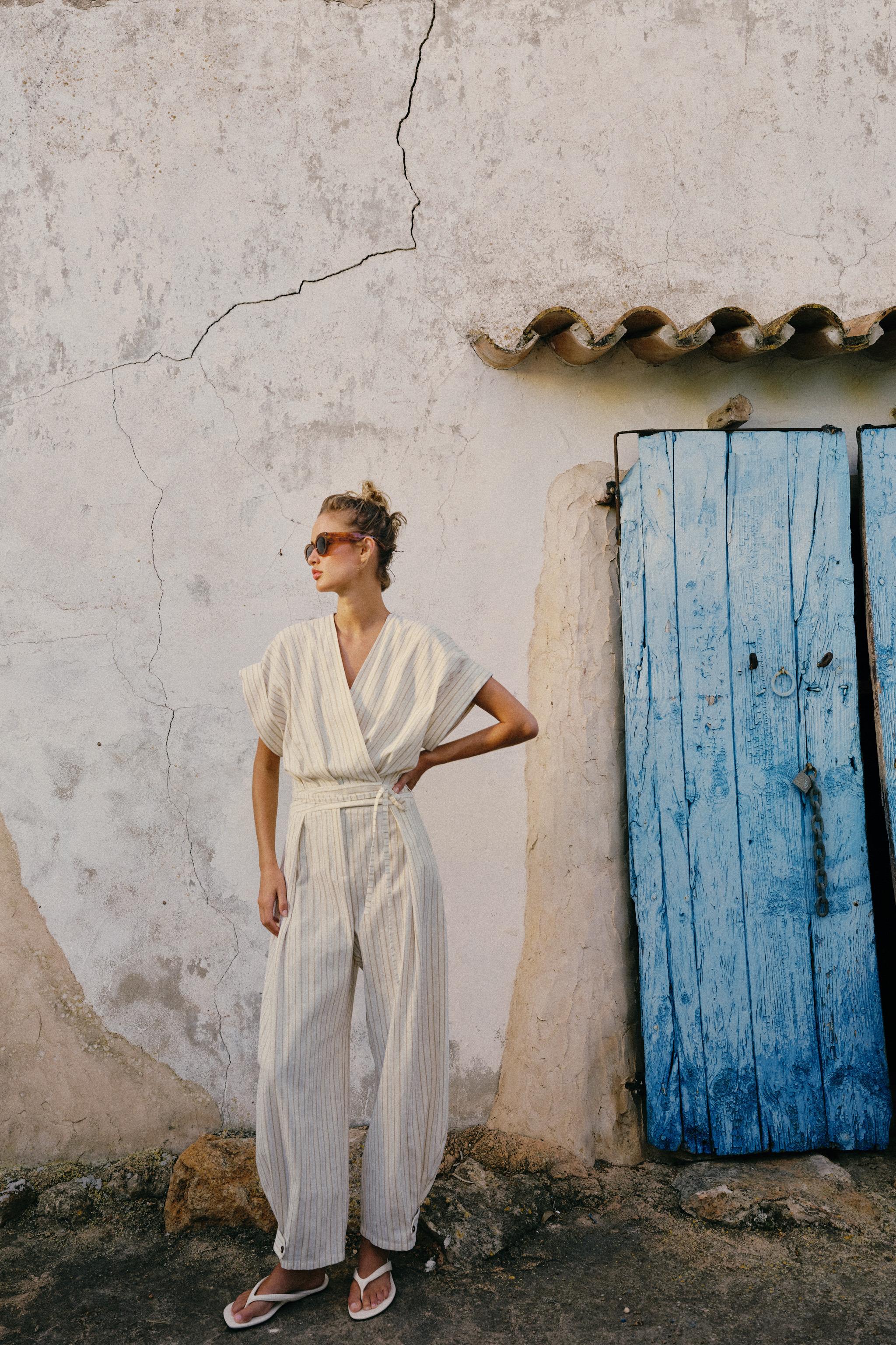 striped jumpsuit with belt