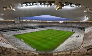 Interior view of the empty stadium arena with the flood lights