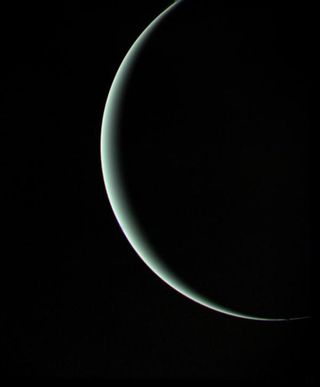 Voyager 2 captured this moody parting shot of Uranus on Jan. 24, 1986, as the spacecraft sped off toward its next adventure at Neptune.