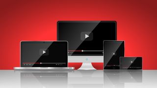Bästa VPN för streaming: Ett gäng teknikprylar som har en video pausad på helskärm. Visas upp mot en röd bakgrund.