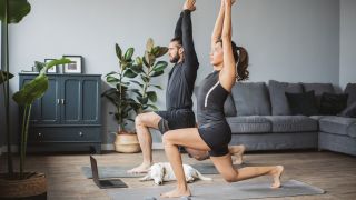 Couple performing Samson lunge at home