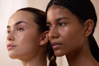 two women with clear glowing skin