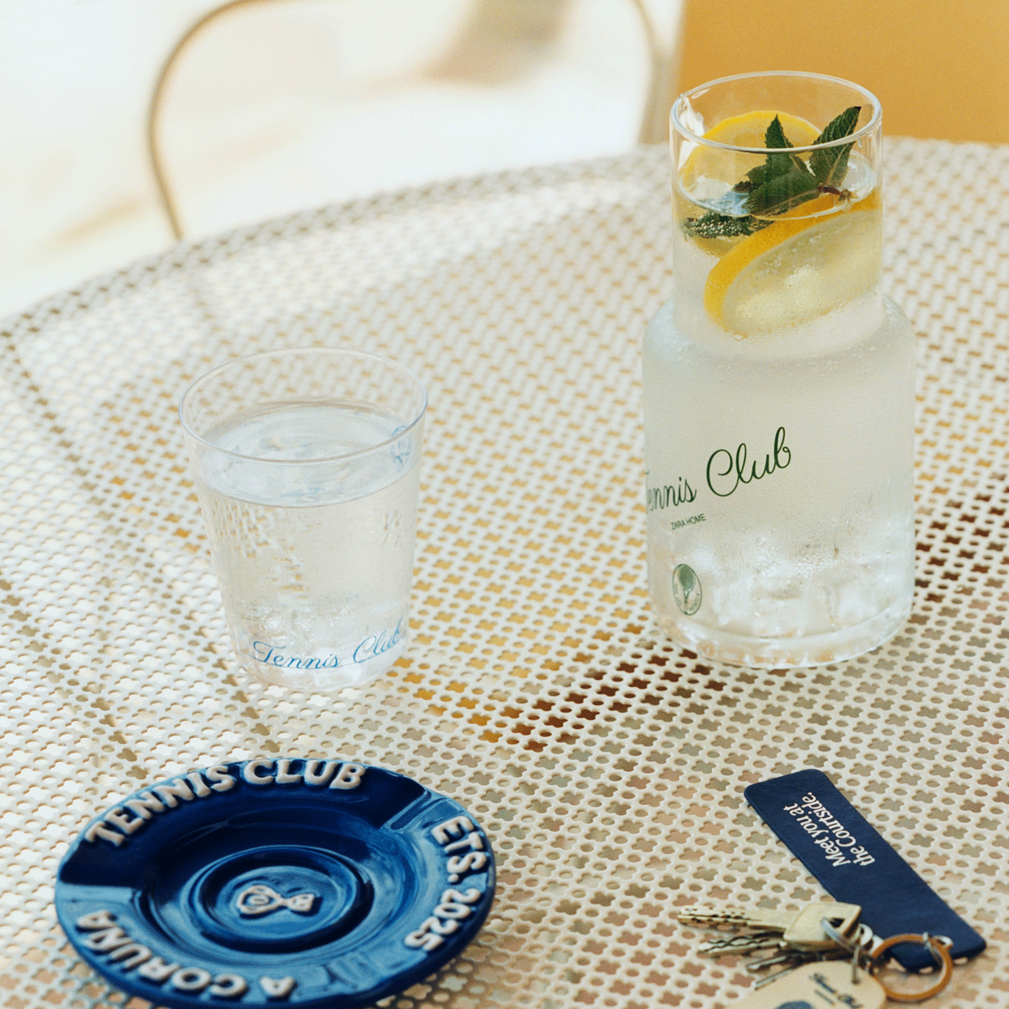 Zara Home collection styled on a white outdoor table