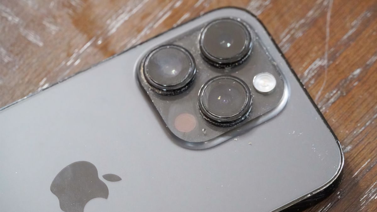 The camera bump of my dad's iPhone 14 Pro before using the Otterbox Mobile Device Care Kit.