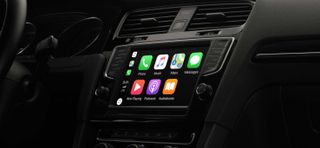 Apple CarPlay brings iOS features behind the wheel. Credit: Apple