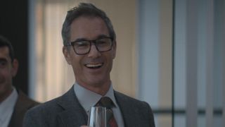 Eric McCormack as Richard with champagne in The Other Black Girl