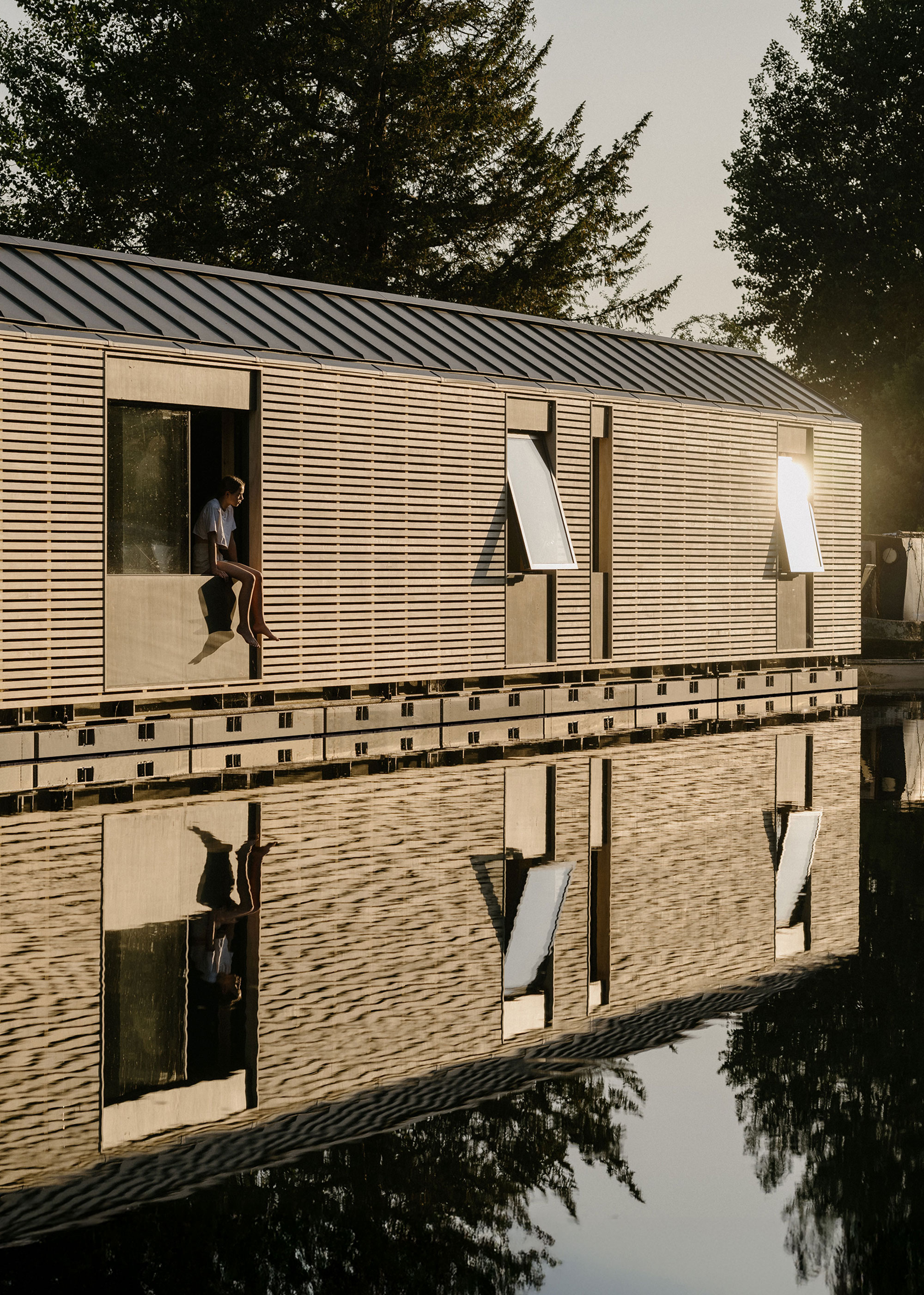 modern floating house with louvred timber