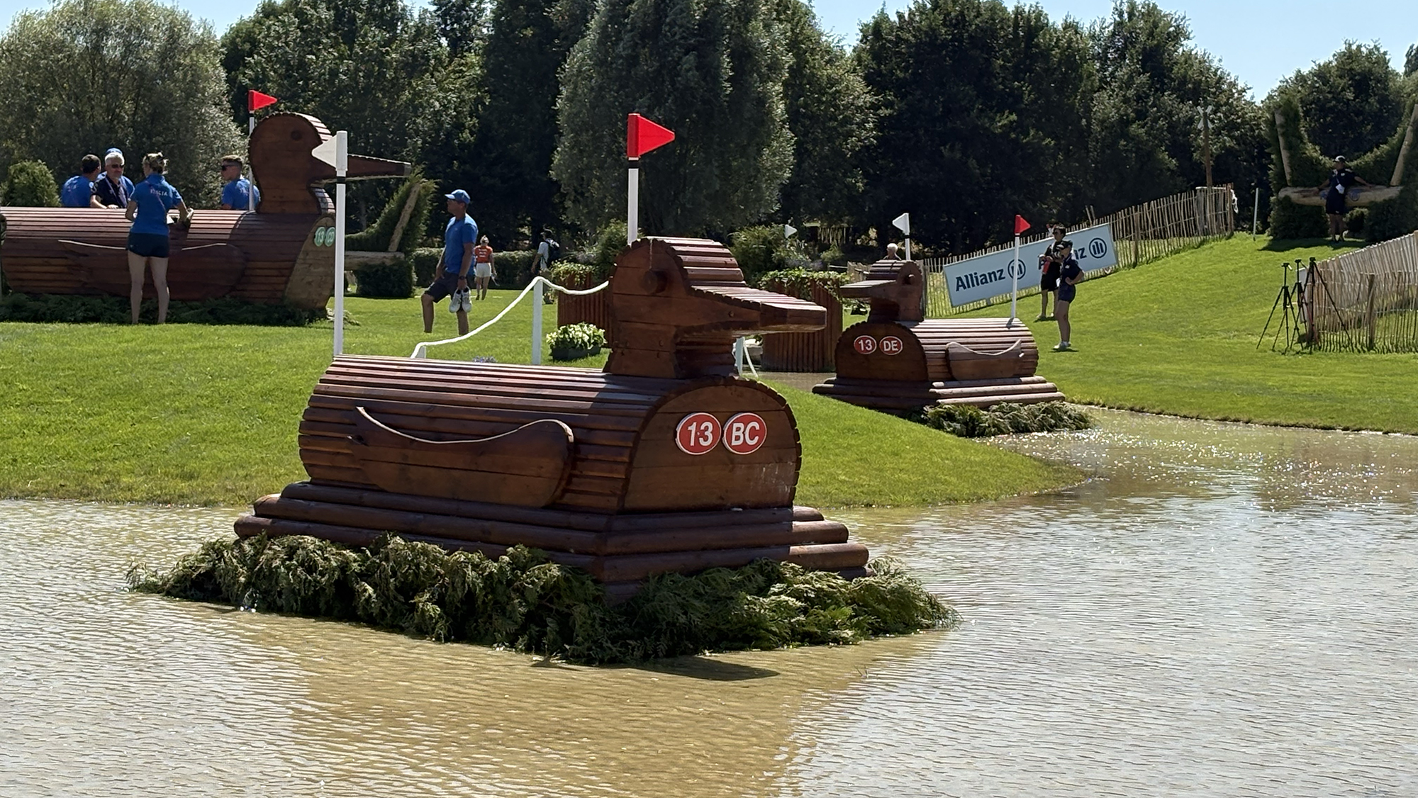 A wooden duck in water on the Aachen eventing World Championships cross-country course