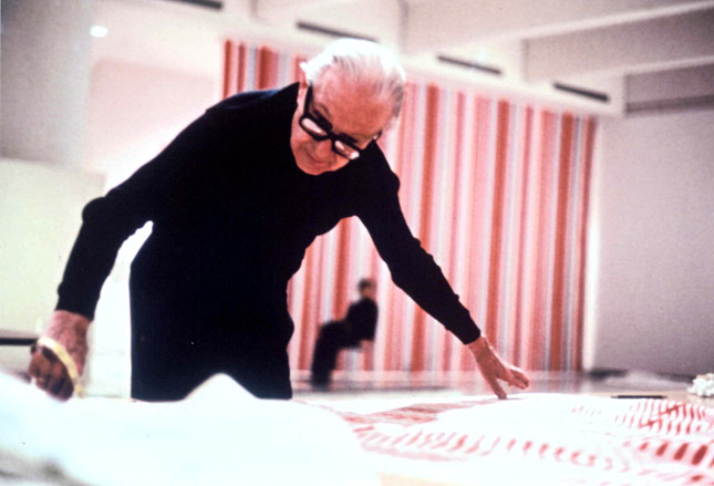 Alexander Girard at work in his studio