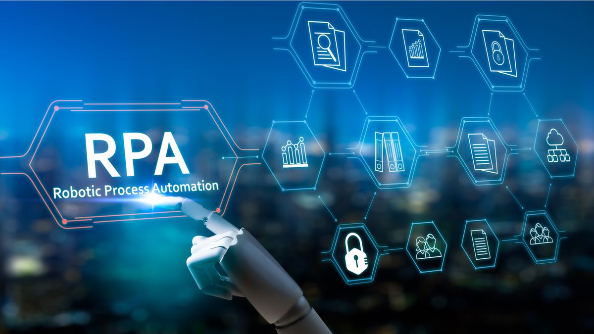 A hand touching a hexagonal hologram that says &amp;quot;RPA robotic process automation&amp;quot;