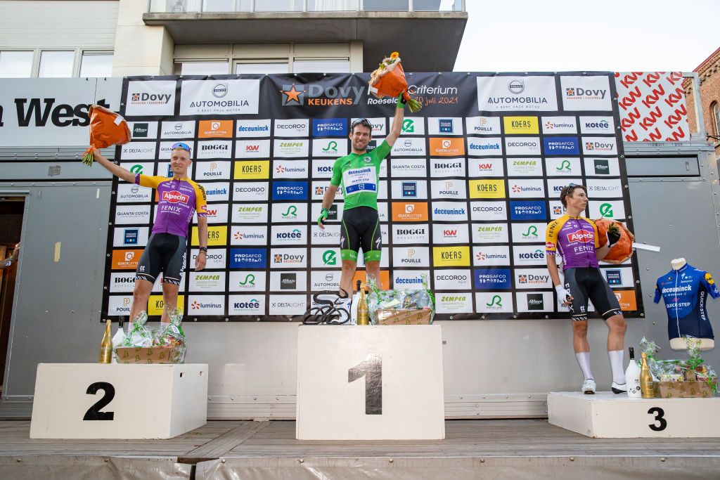 Belgian Tim Merlier of AlpecinFenix British Mark Cavendish of Deceuninck QuickStep and Belgian Jasper Philipsen of AlpecinFenix celebrate on the podium of the Natourcriterium Roeselare cycling race Tuesday 20 July 2021 in Roeselare The contest is a part of the traditional criteriums local races in which mainly cyclists who rode the Tour de France compete BELGA PHOTO KURT DESPLENTER Photo by KURT DESPLENTERBELGA MAGAFP via Getty Images
