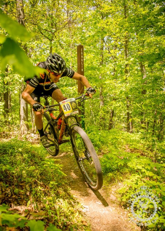Spencer Paxson railing over the finish of Conklin Trail