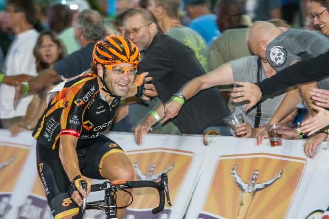 Mike Friedman (Optum) gets high fives from the crowd after his work in the break tonight.