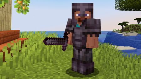 A player stands in a full set of Minecraft Netherite armor