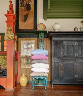 stack of colourful cushions by Magniberg at Larssons' house