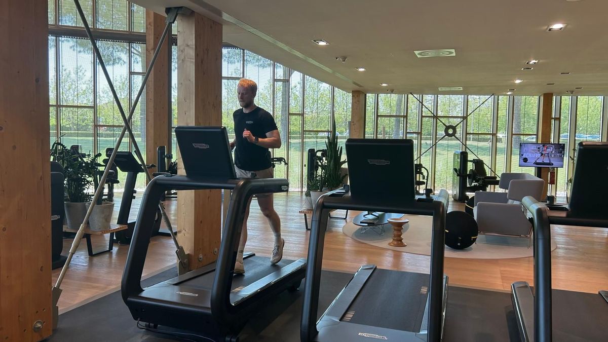 Techtradar fitness writer Harry Bullmore running on a treadmill at the Technogym village