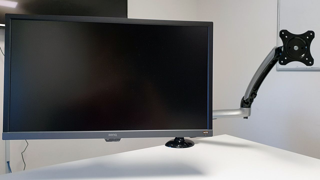 Attaching one monitor at a time, you can work the arms to your preferences.