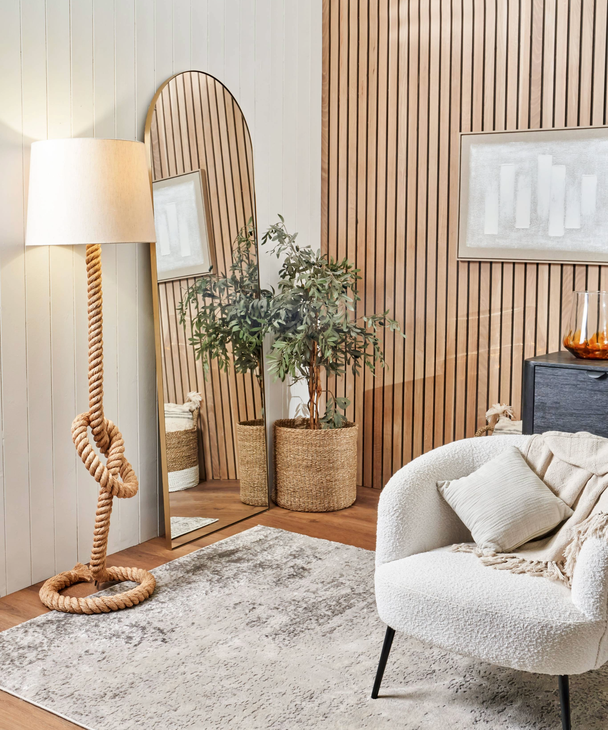 Living room with rope light and wood panelling