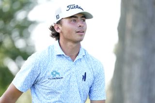 Trevor Gutschewski strikes a tee shot with a driver