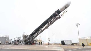 Firefly Aerospace's first Alpha rocket is raised into launch position at Vandenberg Space Force Base in California for a Sept. 2, 2021 launch attempt.