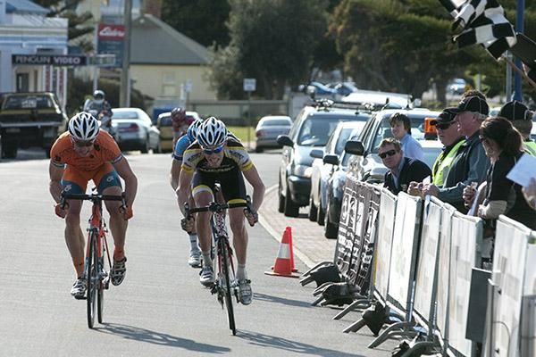 Nathan Haas (left) of Genesys Wealth Advisers and Cameron Jennings (Budget Forklifts) go toe-to-toe in the sprint to the stage nine finish in Penguin.