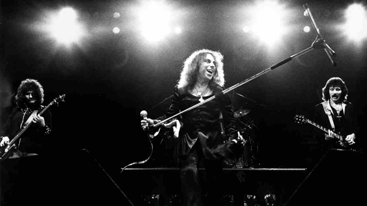 Black Sabbath performing onstage in the early 1980s