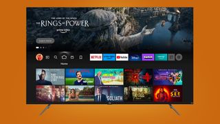 TCL Fire TV on orange background