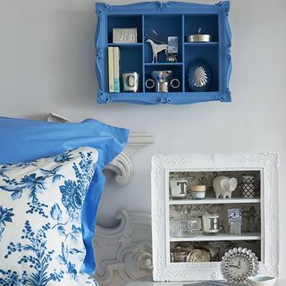 bedroom with box frames and picture frame unit