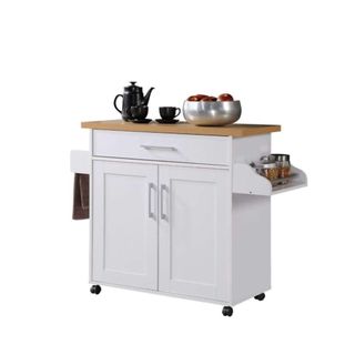 A white kitchen cart with kitchen items on it