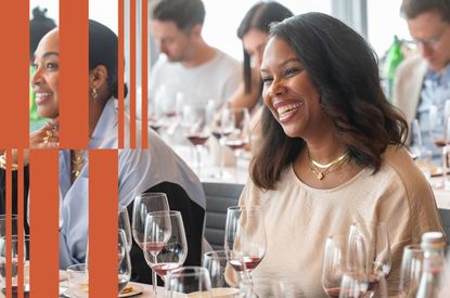 A woman laughs at a wine tasting for Decanter in New York City.