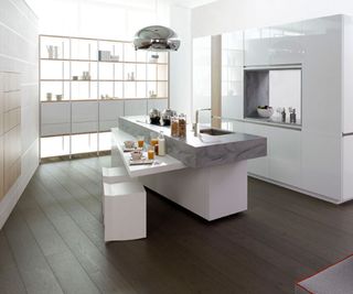 Built-in white kitchen cabinets in a contemporary-style ktichen