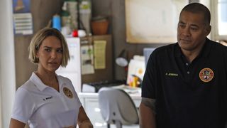 Arielle Kebbel and Robbie Magasiva in Rescue: HI-Surf 