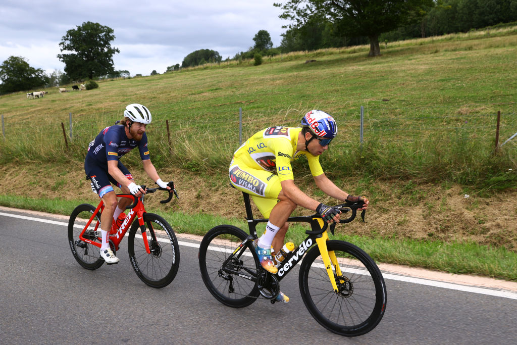 LONGWY FRANCE JULY 07 LR Quinn Simmons of United States and Team Trek Segafredo and Wout Van Aert of Belgium and Team Jumbo Visma Yellow Leader Jersey compete in the breakaway during the 109th Tour de France 2022 Stage 6 a 2199km stage from Binche to Longwy 377m TDF2022 WorldTour on July 07 2022 in Longwy France Photo by Michael SteeleGetty Images