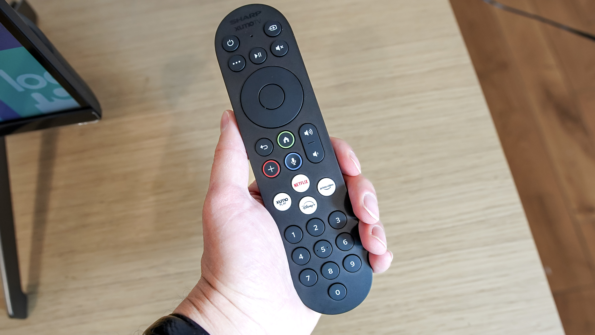 The remote for a Sharp Aquos QLED TV