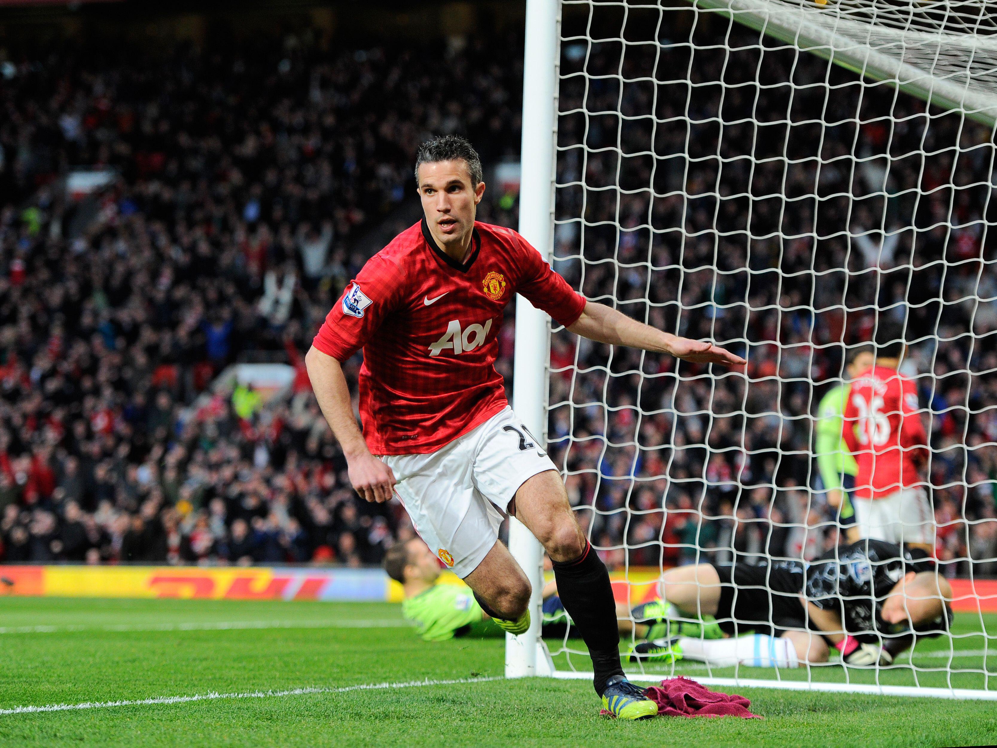 Robin van Persie celebrates after scoring for Manchester United against Aston Villa, 2013