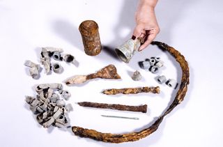 Artifacts found in a three-room house in what is now Ashkelon, Israel. Fishhooks, fishing weights, a stone anchor and a bronze bell reveal a clear tie to the fishing industry during the Ottoman era.