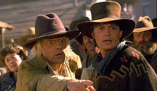 Christopher Lloyd points out something shocking to Michael J. Fox in Back To The Future: Part III.