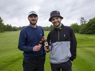 Barry Plummer and Dan Parker enjoy their round of golf
