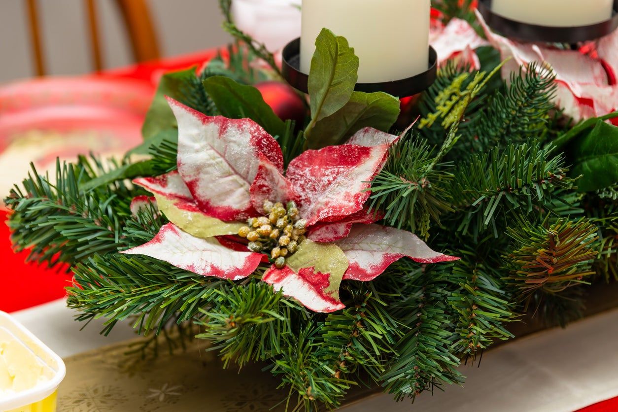 Christmas Centerpiece Of Pine And Poinsettia Flowers