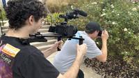 Two students using Sony cameras
