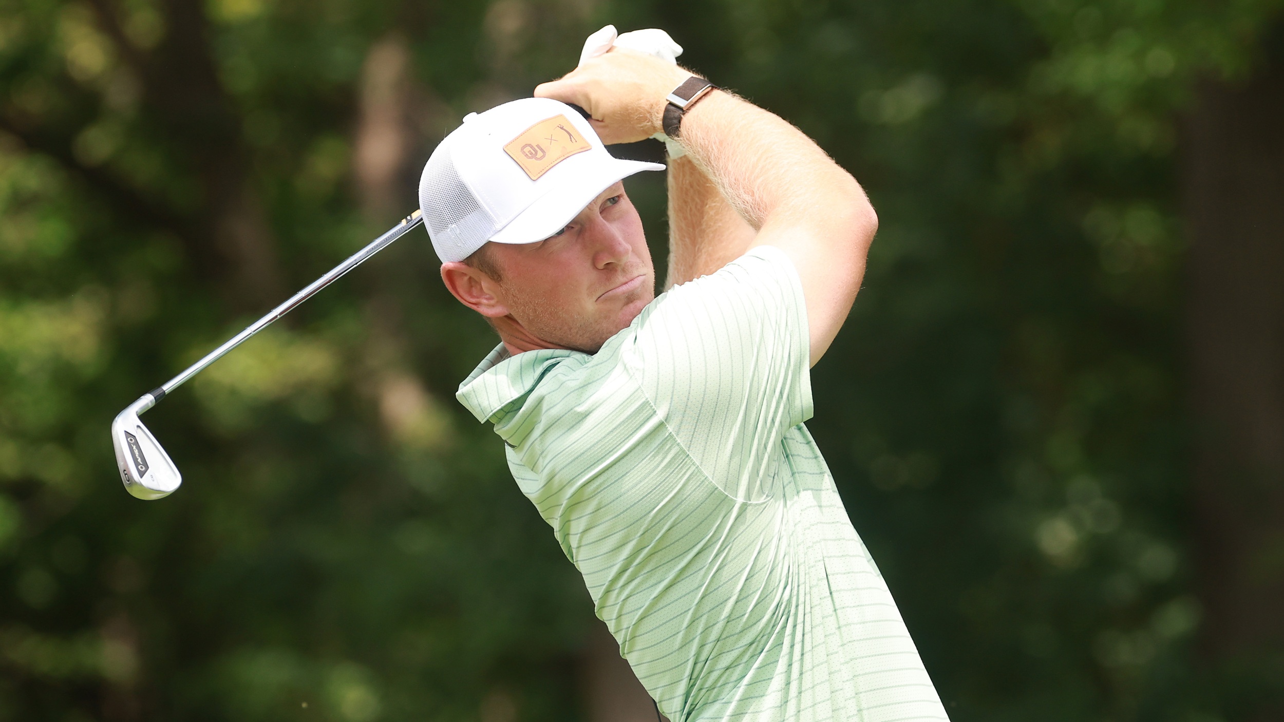 Brad Dalke hitting an iron shot at the 2026 Rocket Classic in Detroit on the PGA Tour